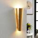 Lindby Perfect gevormde wandlamp Conan in goud