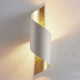 Lindby Metalen wandlamp Vanni, gedraaid, wit-goud