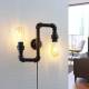 Lindby Wandlamp Josip in industrieel ontwerp, up & down