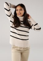 Tamaris Coltrui in streep-look