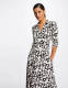 Morgan maxi jurk met all over print en ceintuur zwart/wit