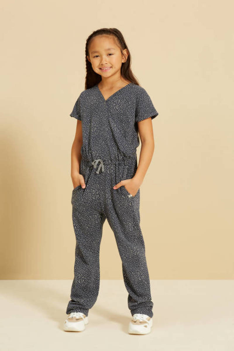 Noppies jumpsuit met all over stippen print blauw