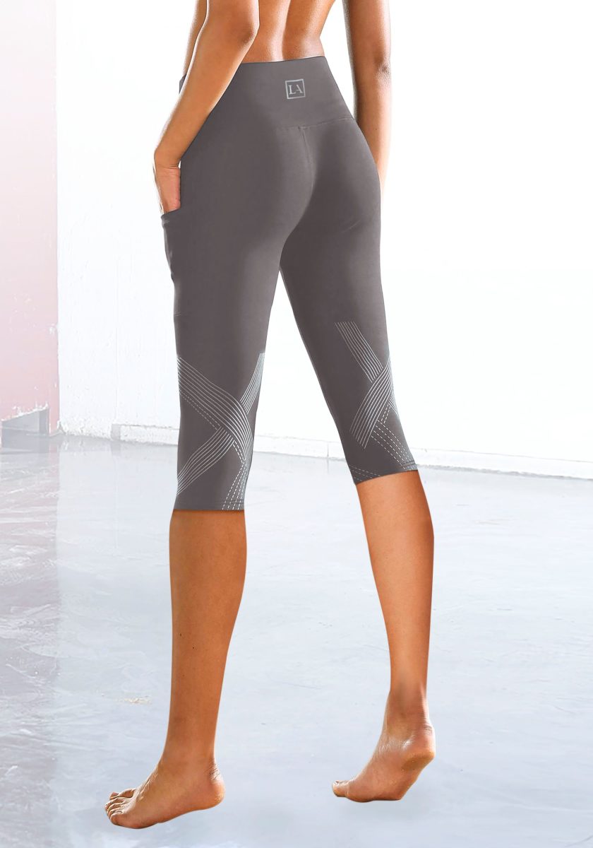 active by Lascana Caprilegging met optisch reflecterende print en tasje voor de mobiele telefoon