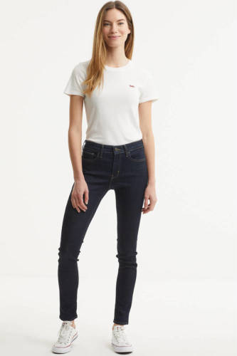 Levi's 711 skinny jeans to the nine