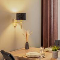 EULUNA Wandlamp Adin, zwart/messing, 1-lamp