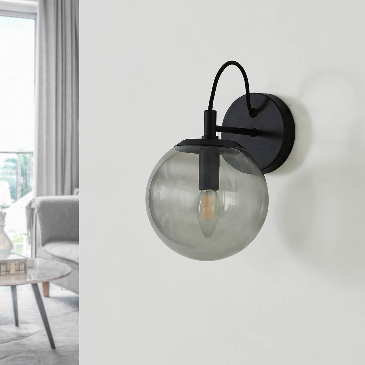 Wandlamp Lucande Sotiana, glazen bol, zwart